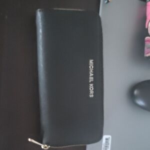 Michael Kors Black Zip Wallet with Silver Logo